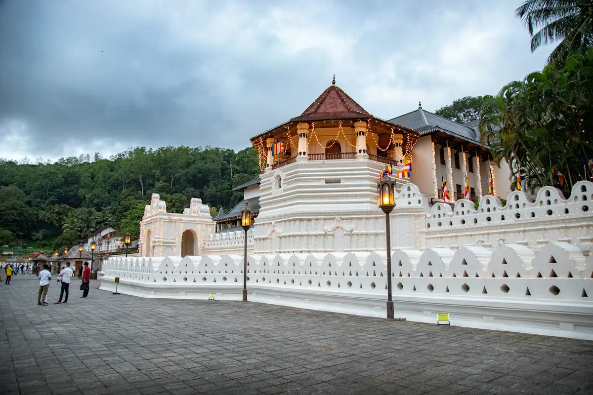 The white Temple of the Tooth Relic complex in Kandy, Sri Lanka